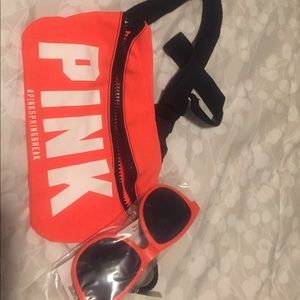 Pink fanny pack with sun glasses